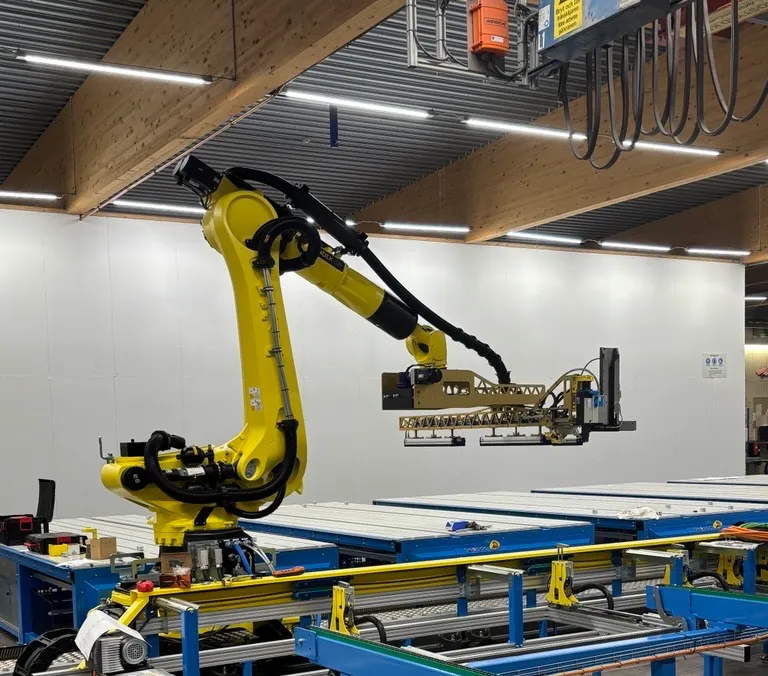A robot assembling roof trusses in Randek&rsquo;s assembly workshop