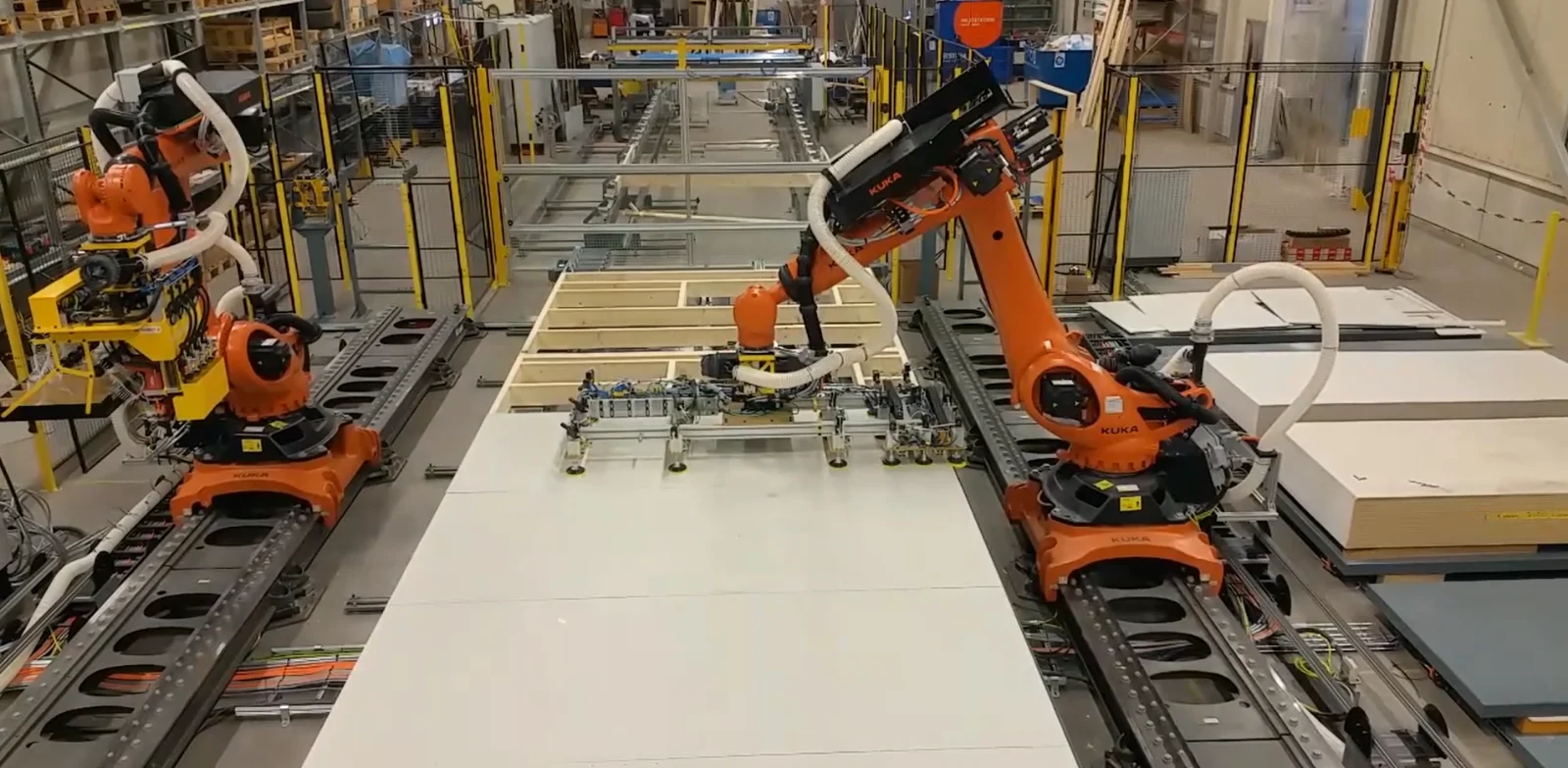 The first ZeroLabor robotic cell: robots building a wall element