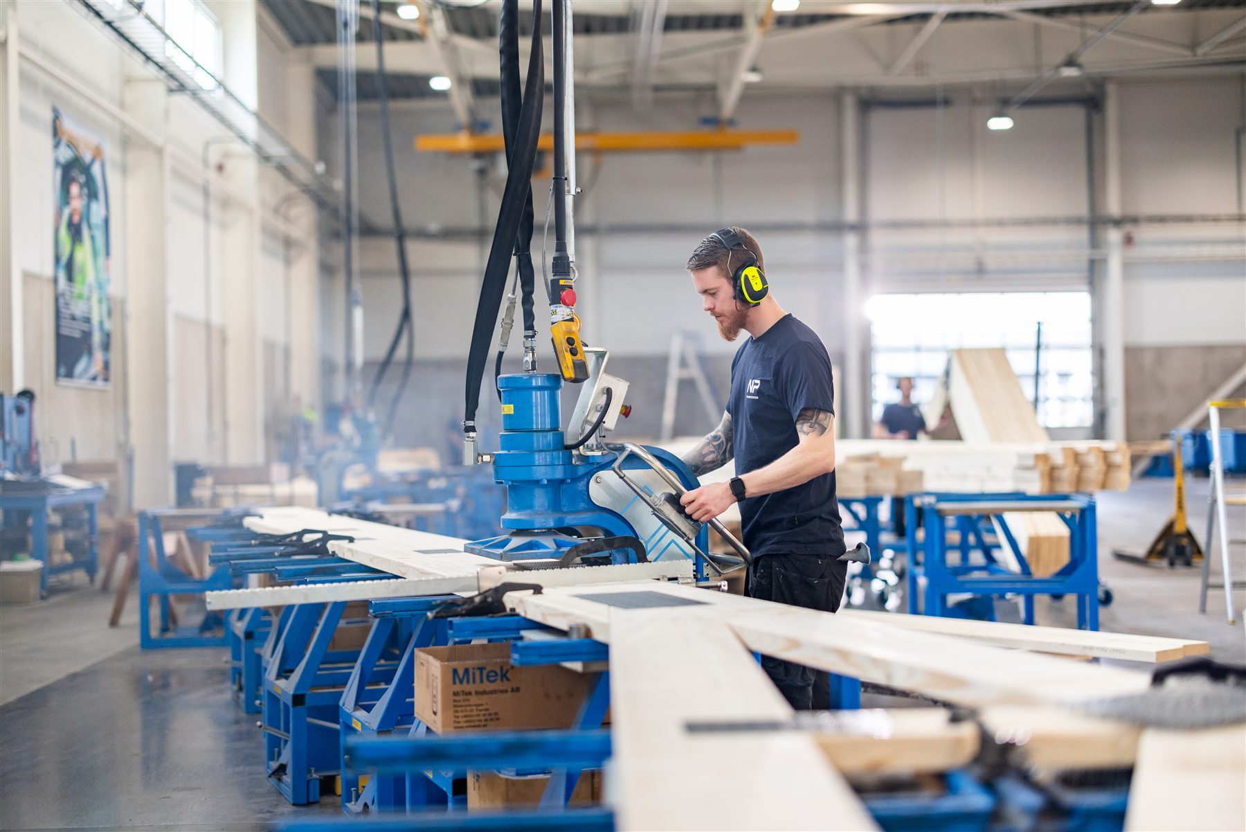 An operator running a Randek truss line