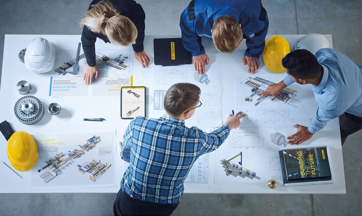 A pre-study in progress: system layouts, machine renders and capacity graphs across the table